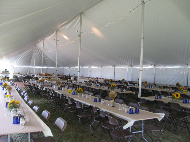 inside of a 40 ft. x 120 ft. Celina Classic Pole Tent